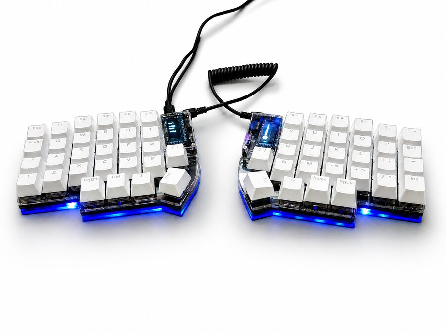 Assembled Lily58 with white keycaps, photographed on a white background